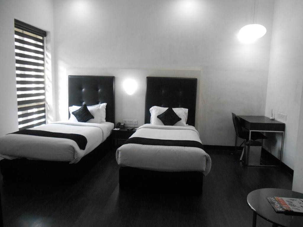 Sapphire Suite Καλκούτα Δωμάτιο φωτογραφία